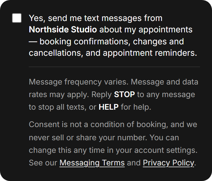 The text-message opt-in as it appears while creating an account: an unticked checkbox beside a statement naming the business and listing booking confirmations, changes, cancellations and reminders, above a note that message frequency varies and rates may apply, instructions to reply STOP or HELP, and confirmation that consent is not a condition of booking.